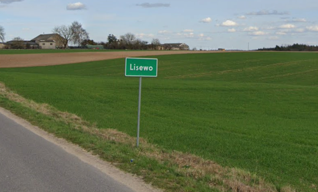 Tablica informacyjna z napisem Lisewo